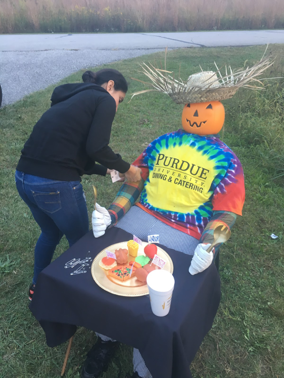 Dining ambassador Harpreet, hard at work creating our scarecrow